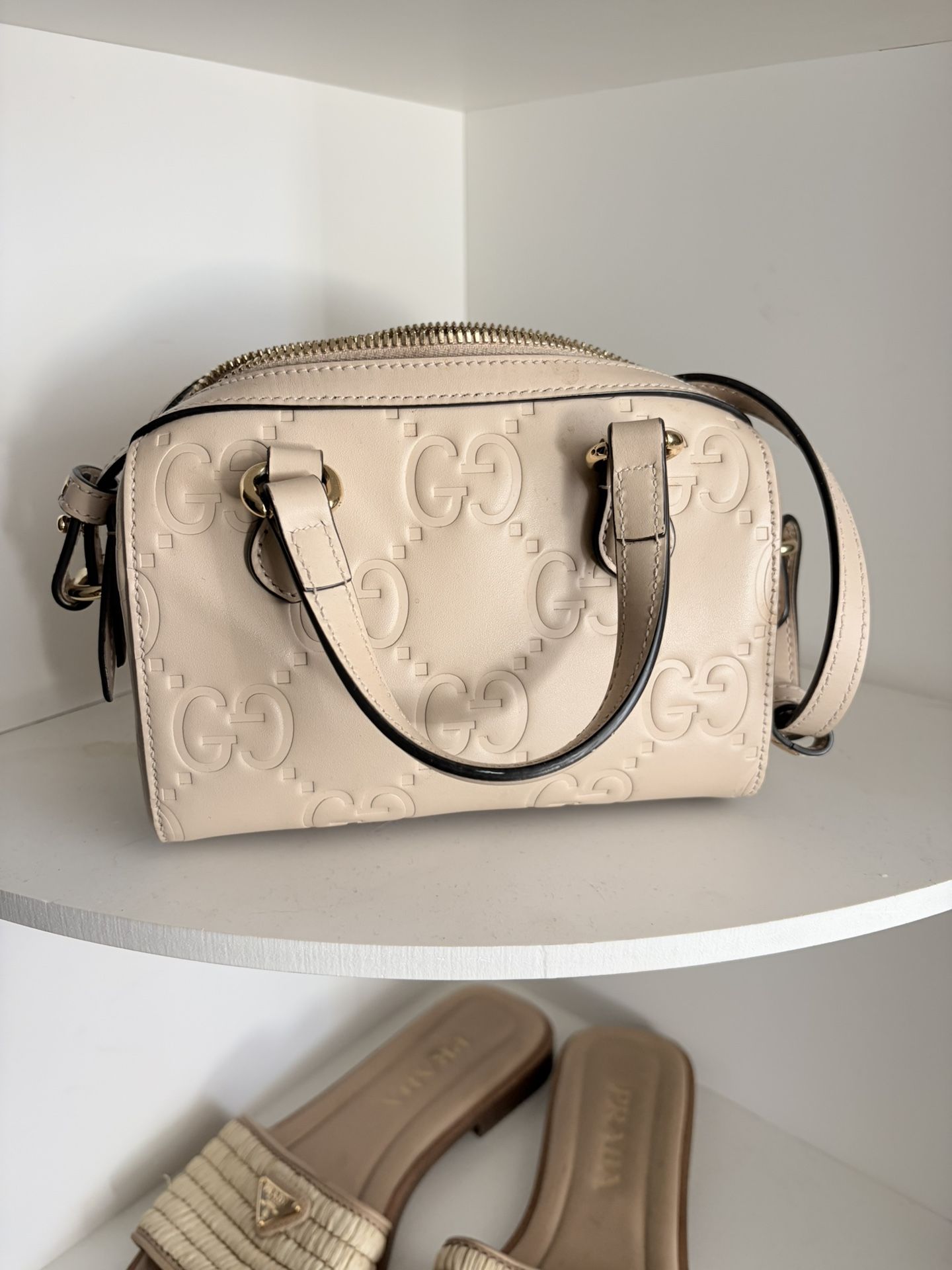 Gucci GG Super Mini Top Handle Bag (also known as the Gucci GG Super Mini 2-Way Handbag