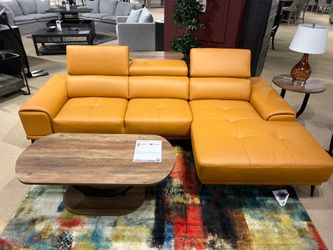 New Left or Right Leather Match Sectional.  Metal Legs.  110”x68”.29”H.  Free Delivery!