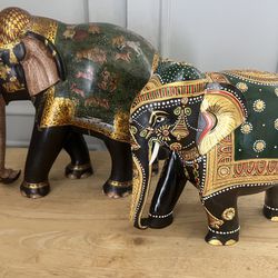 2 Himalayan Wood Elephant Sculptures - hand carved 8 inches and 10 inches in height