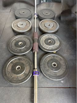 Bumper plates with bar