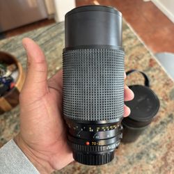 Minolta MD Zoom 70-210mm f/4 manual focus telephoto zoom lens. 