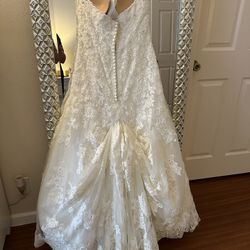Lace cathedral A Line wedding Dress Designer Morí Lee