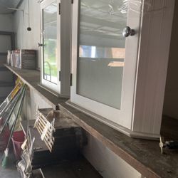 2 white bathroom wall cabinet with a glass-fronted door