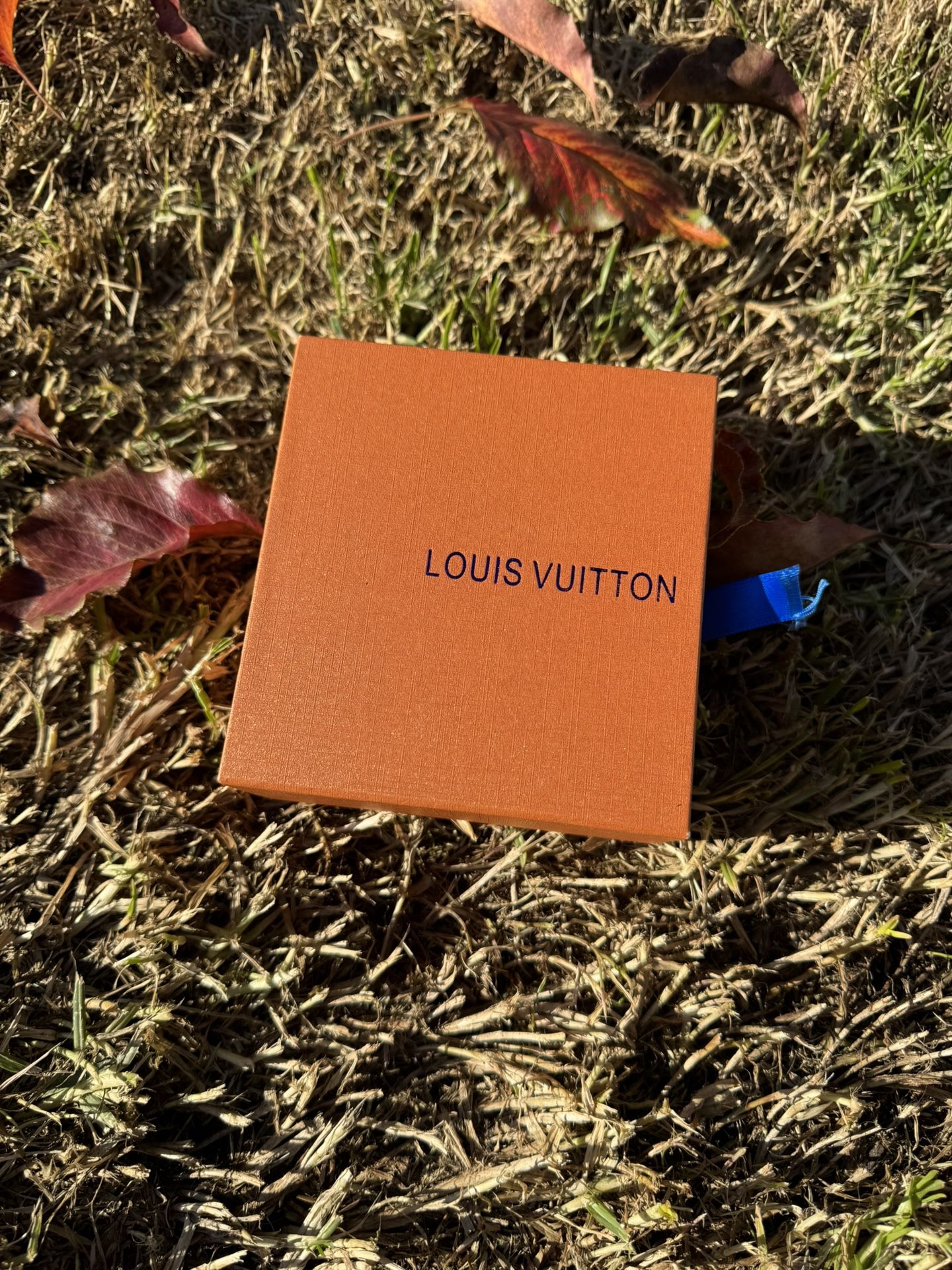 Louis Vuitton LV Initiales reversible belt in Monogram Eclipse canvas with a gold-color buckle.