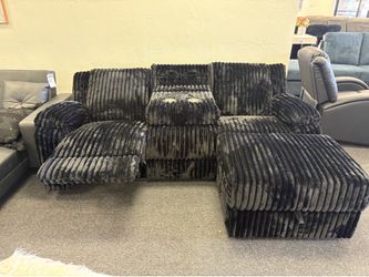 Reclining sofa with storage chaise