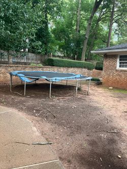 Trampoline and basketball goal
