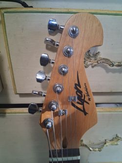 OBO.    ELECTRIC GUITAR.  Brand: Lyon by Washburn.Model Type: Often sold as a beginner or "entry level"