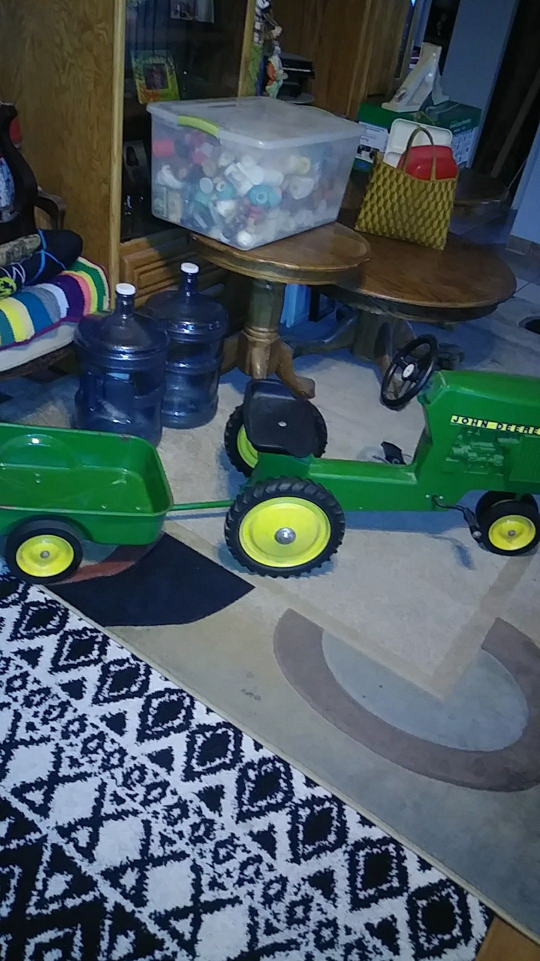 John deer kids tractor with trailer.
