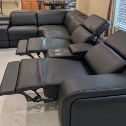 New 8 Piece / 4 PWR Reclining Sectional.  Genuine Italian Leather.  123” X 151” X 35”H.  Free Delivery!
