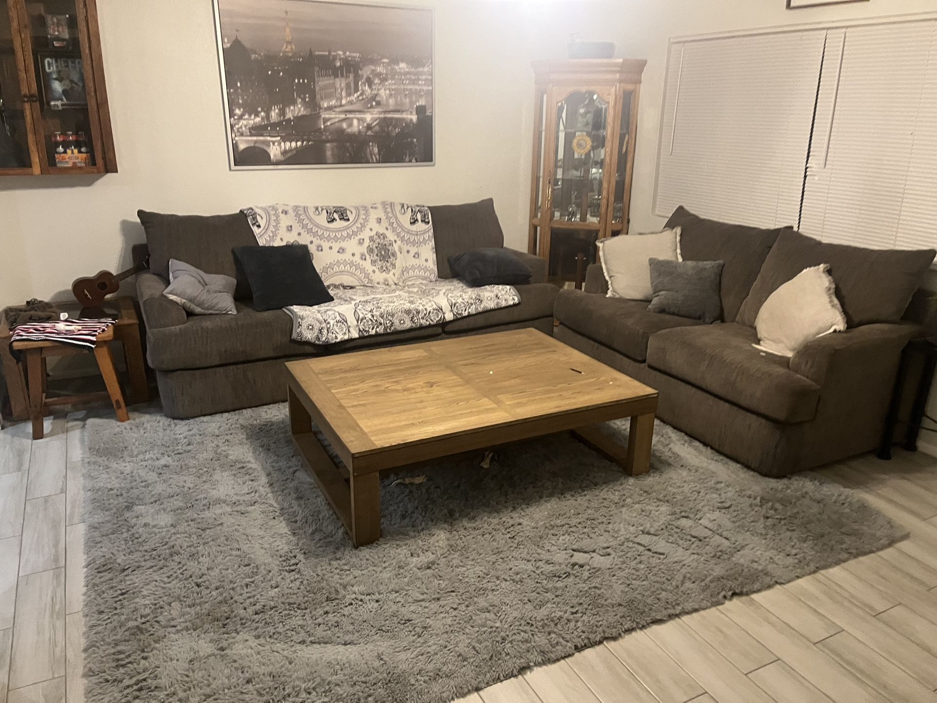 Couches, Coffee Table, And Corner Display Case 