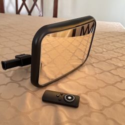 Mirror with light and control to monitor baby in the car