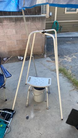 Outdoor encampment set up 10 by 10 ez up canopy tent 96 by 72 tube tent two out chairs and stools aluminum rack outdoor backpack 40w solar panel eray