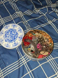 Cookie tin full of random jewelry