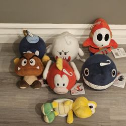 collection of mario enemy plushies