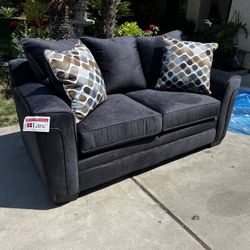 Brand New. Lane sofa. Slate color with accent pillows. Only 1 available. $399 