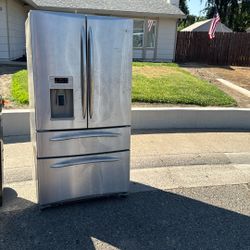 Free GE Profile Refrigerator. 