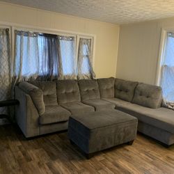 Grey Sectional + Ottoman ‘ 