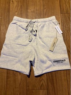 Fear of God, a essential shorts, light oatmeal size medium comes with bag and tag