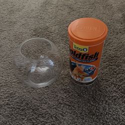 goldfish bowl and food