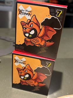 Hello kitty x godgilla happy meal toys