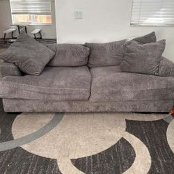 65in Samsung LG surround system And Two Couches 