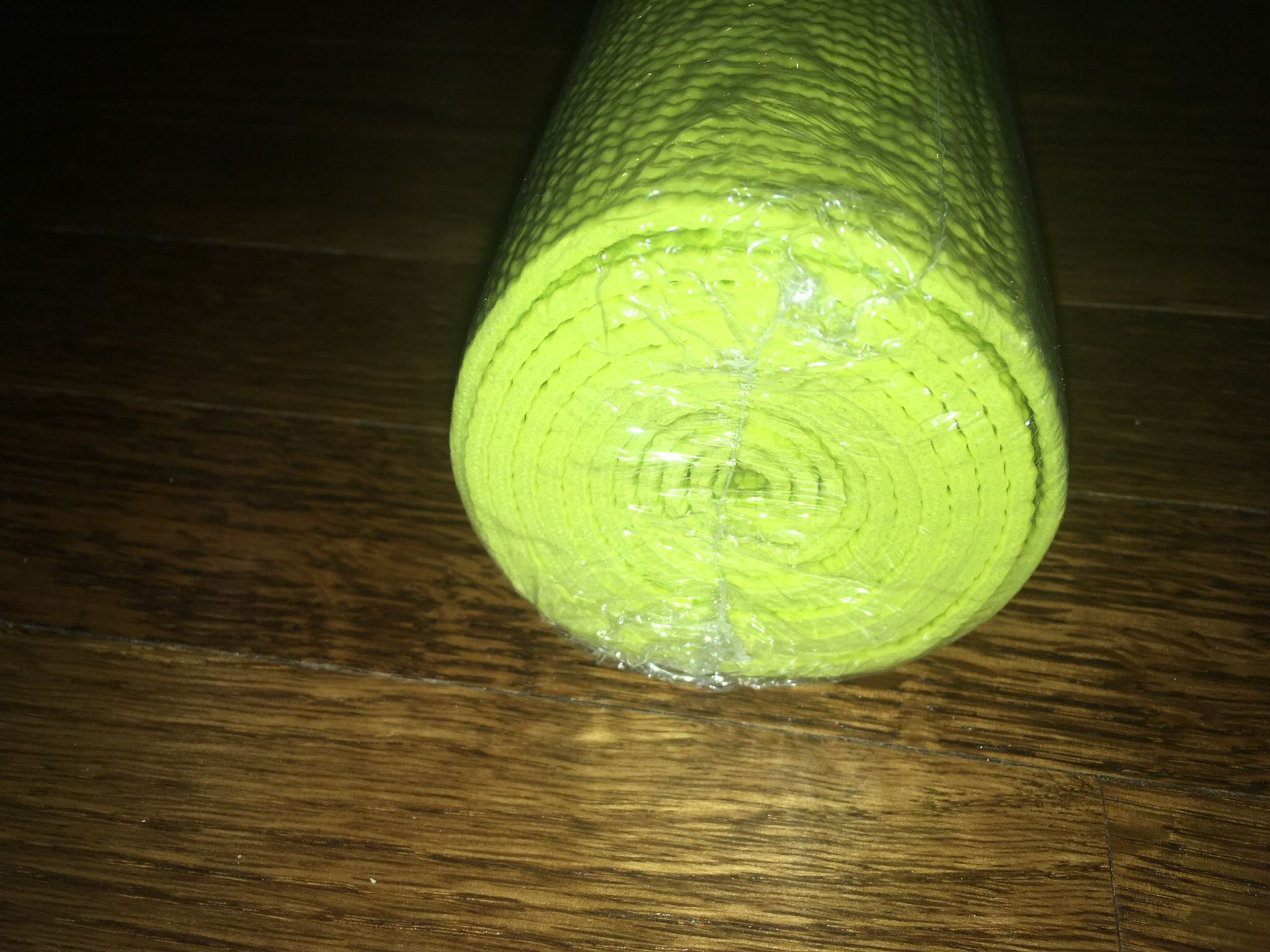 Brand new bright yellow yoga mat