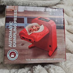 Automatic dumpling press