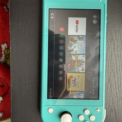 Nintendo Switch Lite (Turquoise) – Fully Working – Screen Scratch (Shown in Photos)