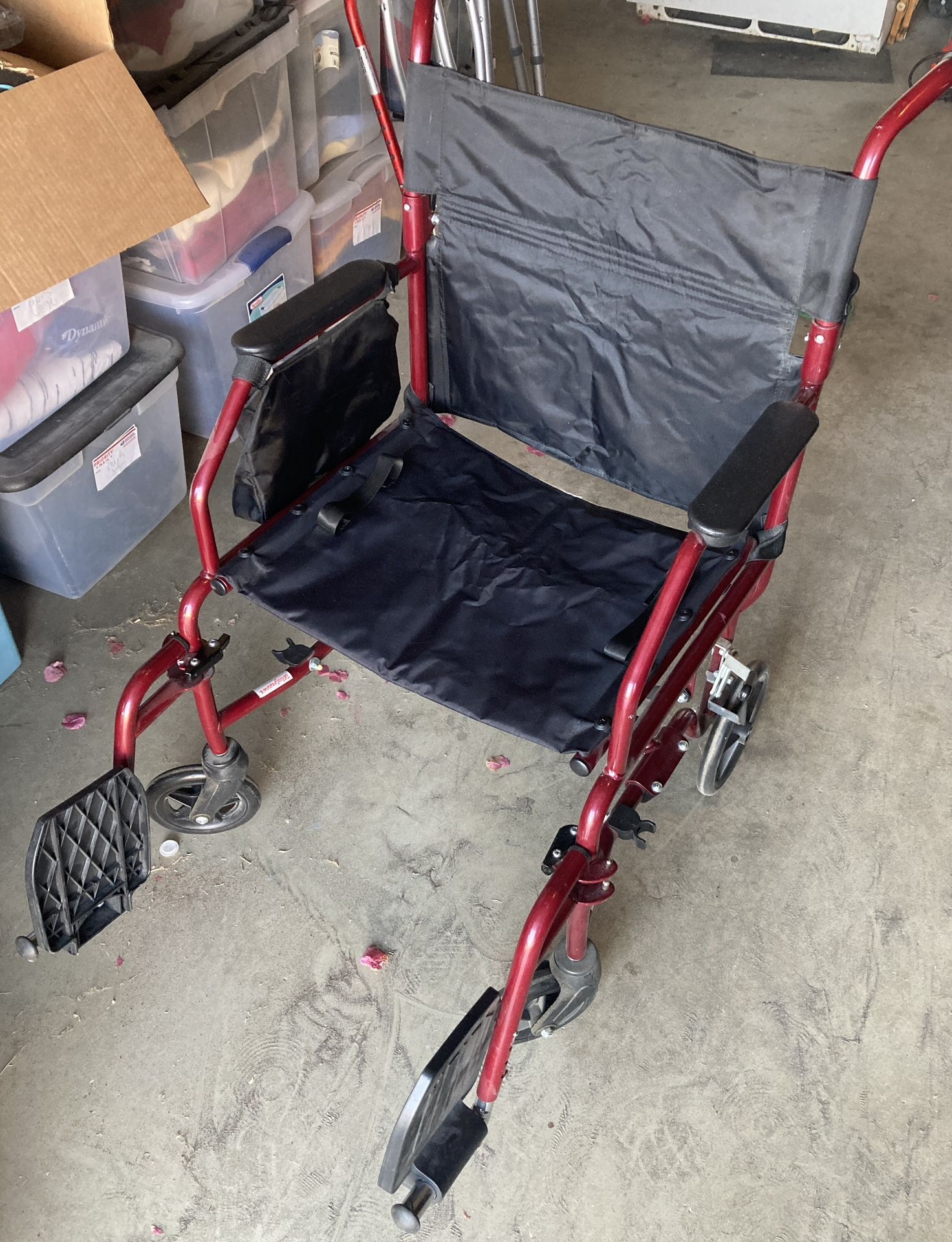 Red wheelchair / Transpirtation Chair with pedals Light Weight Really Good Condition 