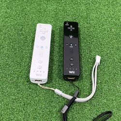 2 Nintendo Wii Remotes