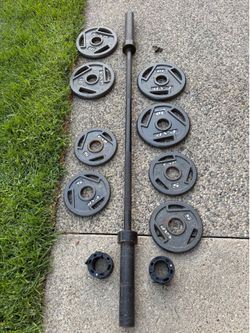 5ft BAR WITH 4x10 AND 4x5lbs WITH COLLAR LOCKS $90 FIRM