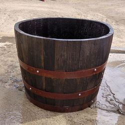 Wine barrel  planter box.