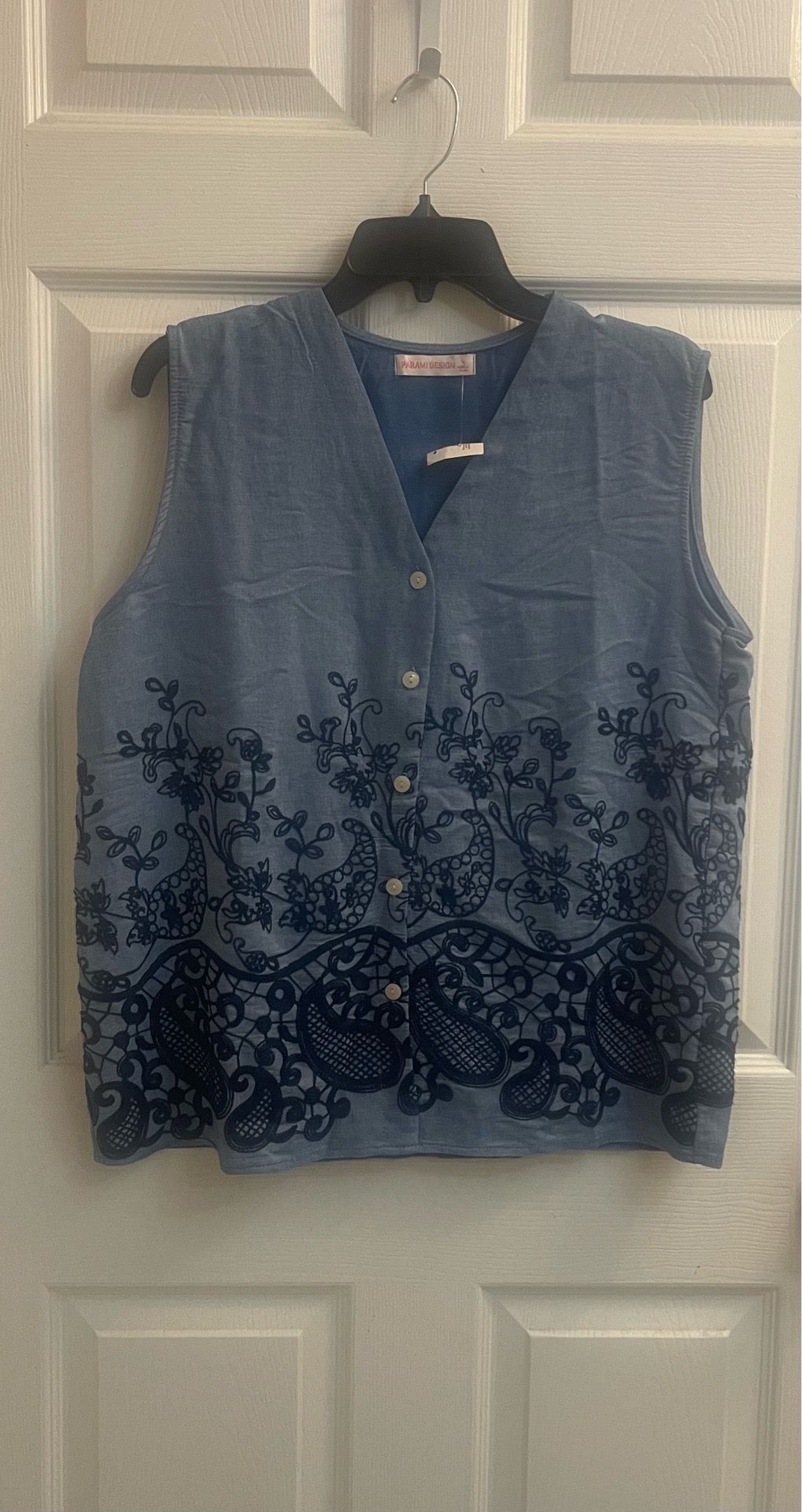 Brand new Ladies blue embroidered top size L