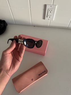 Miu Miu Black Cat-Eye Sunglasses with Case