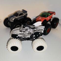 lot of 3 diecast Monster trucks Hotwheels type cars