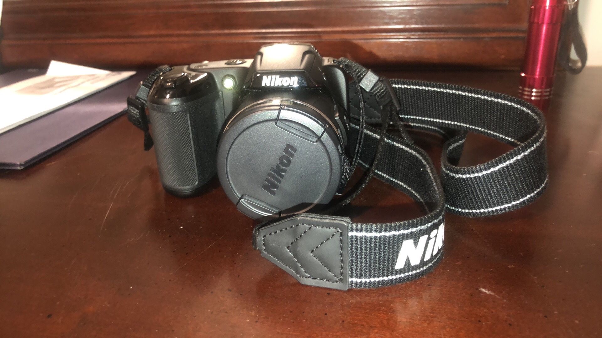 Nikon coolpix L810 with sd card and bag