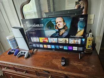 Ps5 with two remotes with 40 inch tv