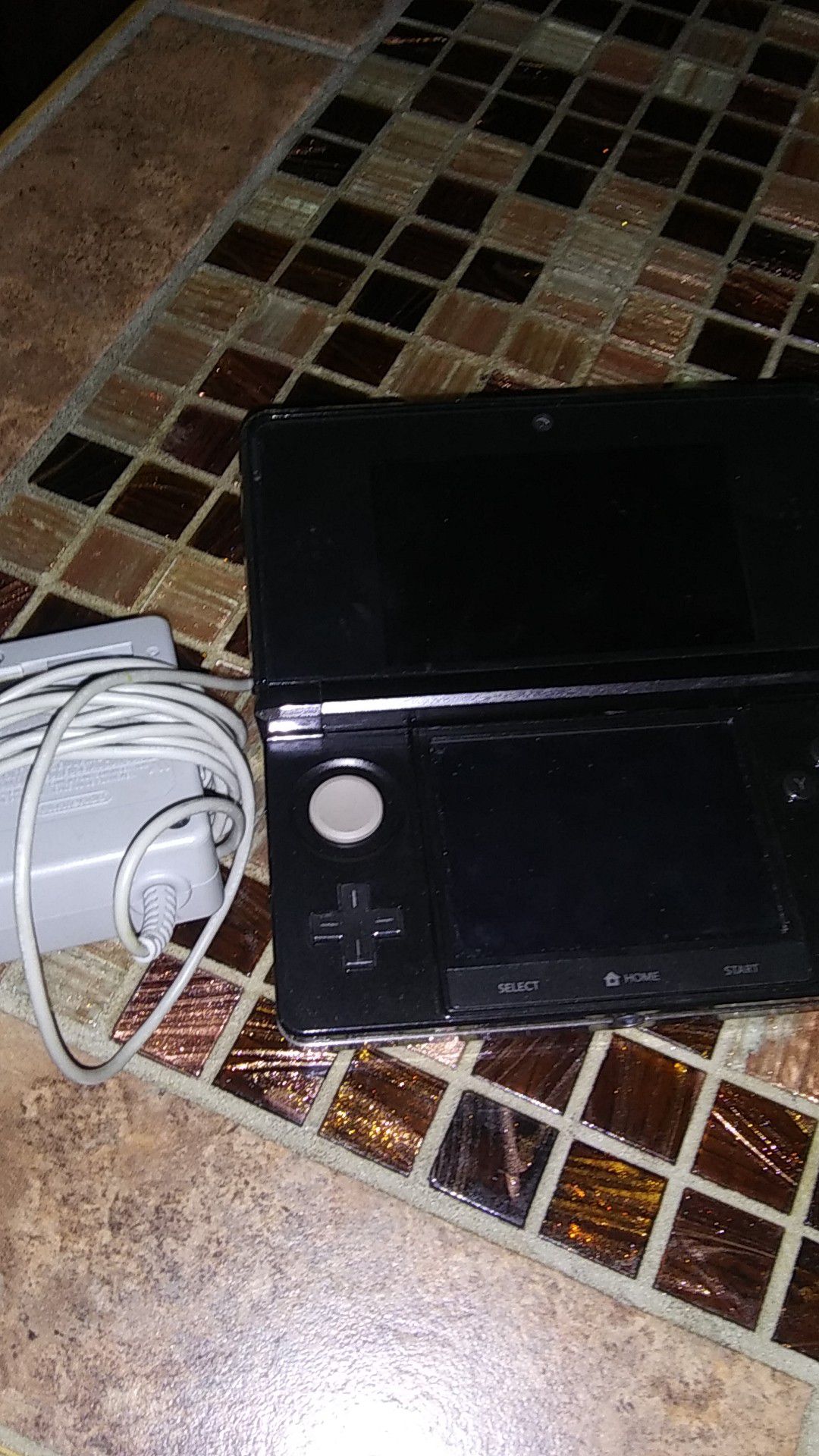 Nintendo 3ds with Mario and charger included