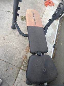 Adjustable Bench press wth preacher curl and quad extension