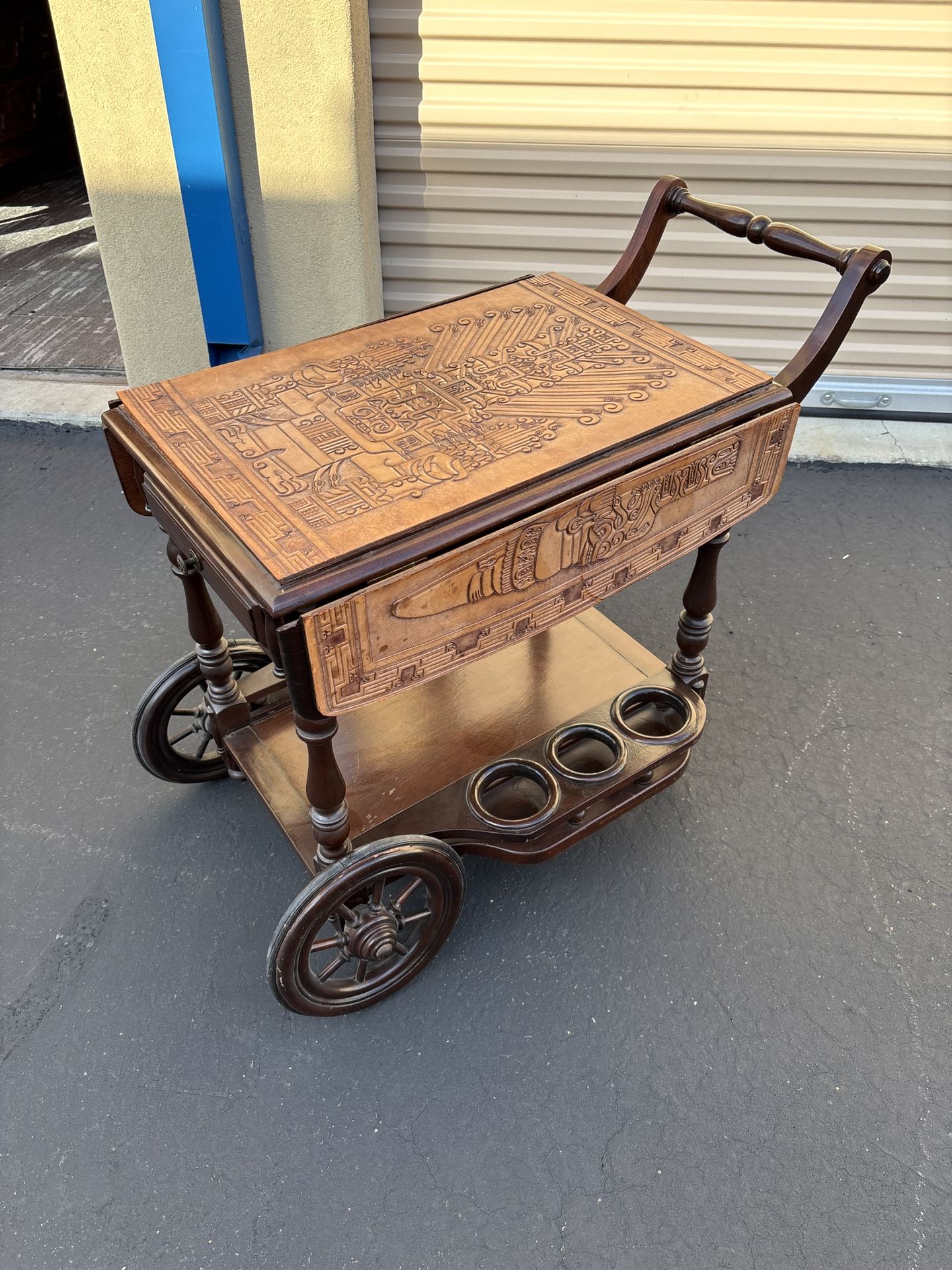 Stamped leather top bar cart on wheels