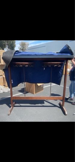 Vintage rotating clothing rack
