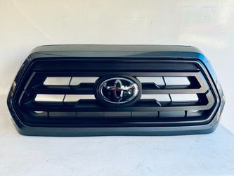 2016-2023 TOYOTA TACOMA FRONT BUMPER GRILLE OEM