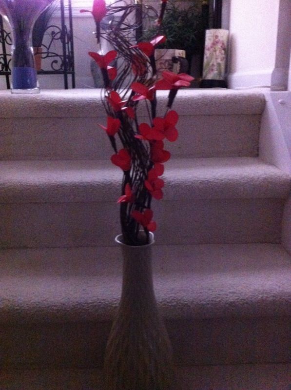 Cream vase filled with flowers