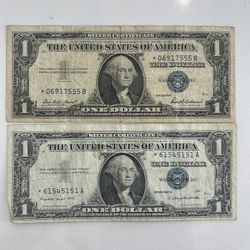 Two 1957 $1 Silver Certificate Star Notes 