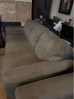 Pair of matching couches, very comfortable, two 3 seater sofas