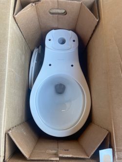 Highline Arc 12 in. Rough In 2-Piece 1.28 GFP Single Flush Round Chair Height Toilet in White with Soft Close Seat