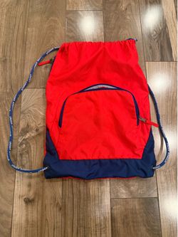 Under Armour drawstring, red bag