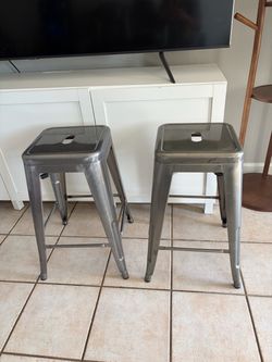 Gray metal barstools