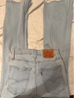 Flare ripped Levi’s jeans