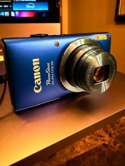 Canon PowerShot ELPH 115 IS 16.OMP Digital Camera Blue SD Card Charger & Battery case Basically New